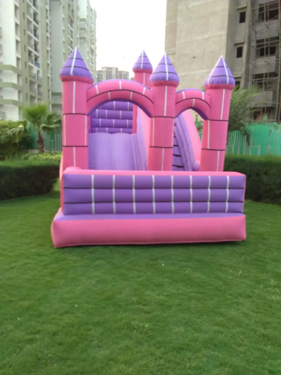 pink castle bouncy for birthday party